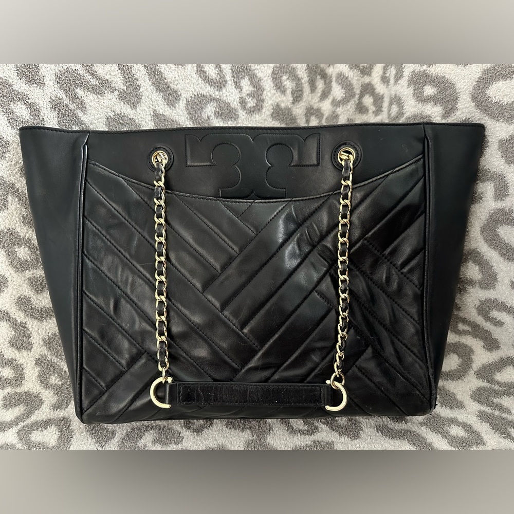 Black and gold Tory Burch leather bag